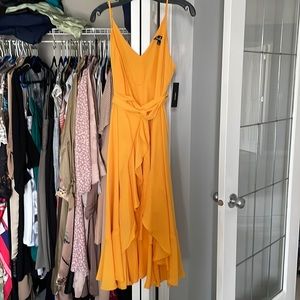 Lulus yellow wrap dress with ruffled edges in a large tags on